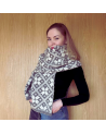 Woman's woolen scarf-shawl