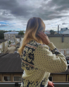 Woman's sweater with a deer